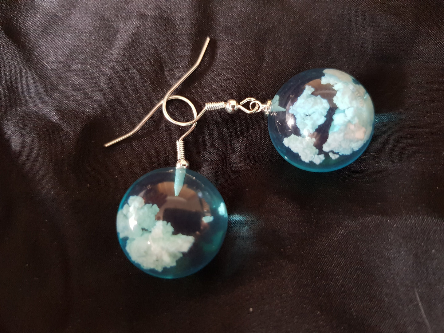 Blue sky and clouds resin earrings.