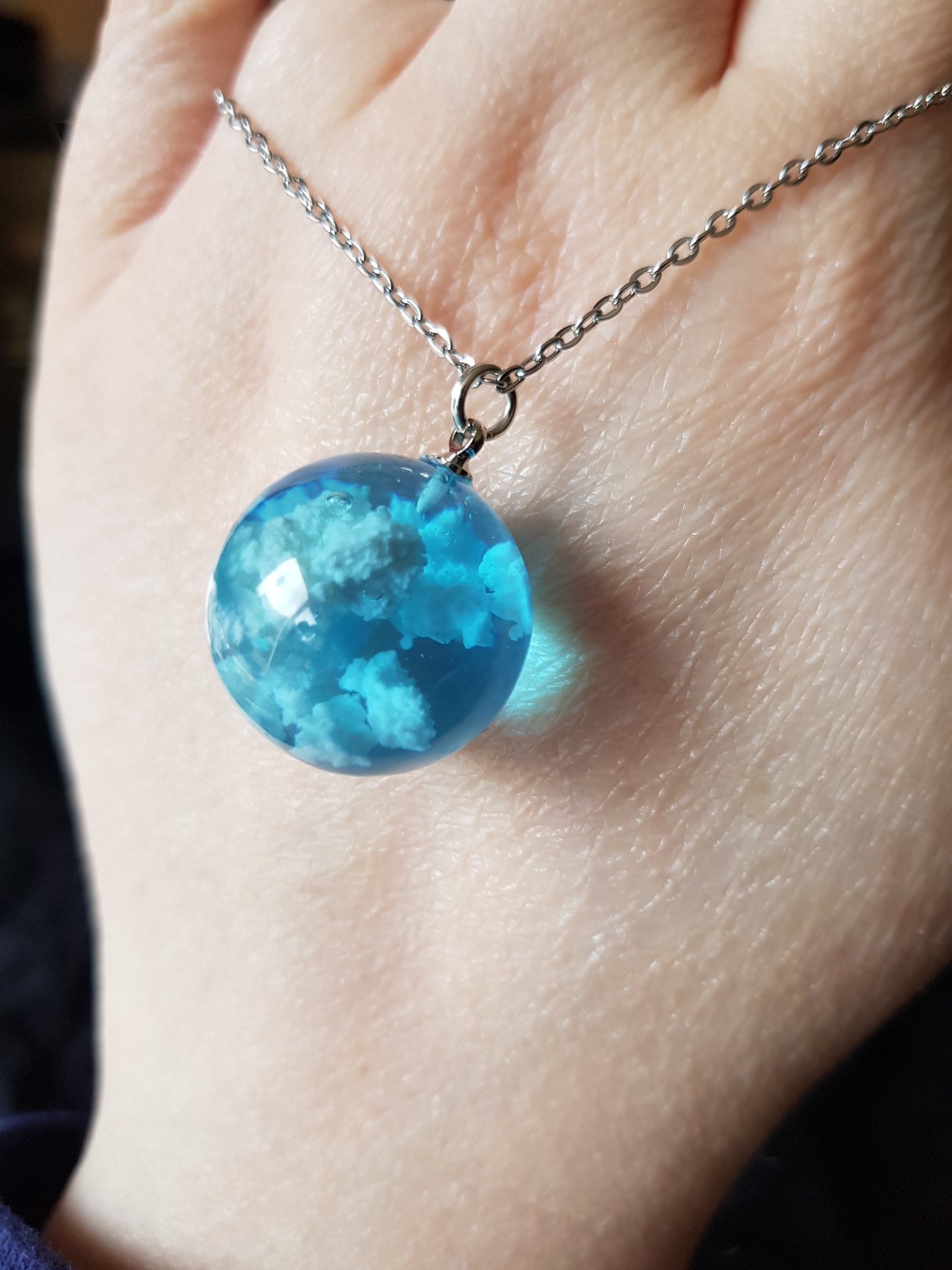 Blue sky and clouds resin pendant