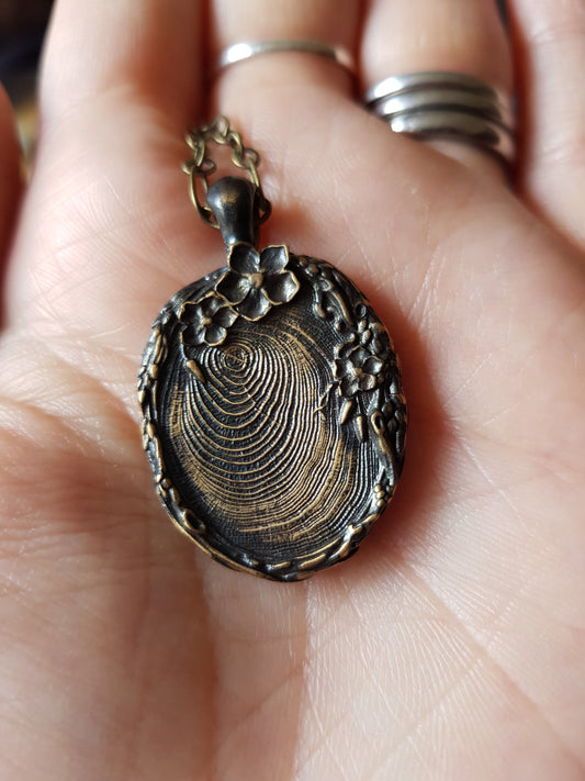 Reversible Bronze Floral and Nature Inspired Pendant