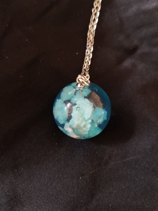 Blue sky and clouds resin pendant