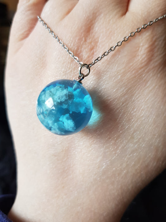 Blue sky and clouds resin pendant